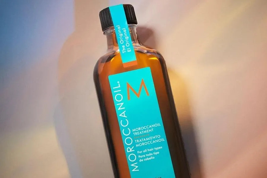 Tinh dầu Moroccanoil Treatment là dầu dưỡng tóc khô xơ