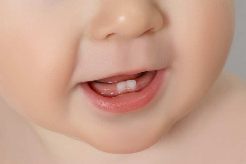 Tại sao bé chậm mọc răng