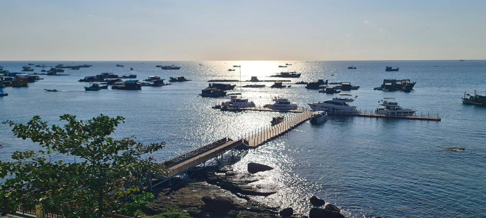 Floating walkway to water bus at Sunset Town.