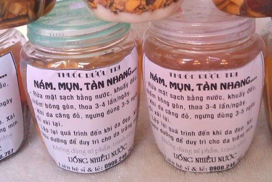 Dùng thuốc rượu trị mụn có tốt không? Da bị nhiễm thuốc rượu